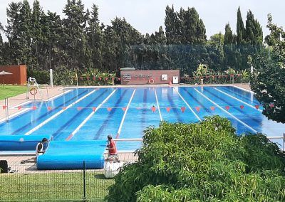 Instalación de Manta Termica en la piscina de Montemar